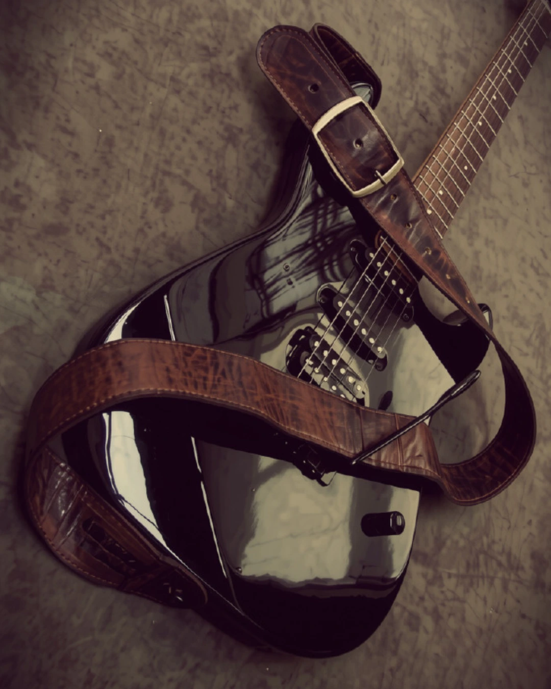 ACID · GAIA STRAPS sobre guitarra eléctrica negra